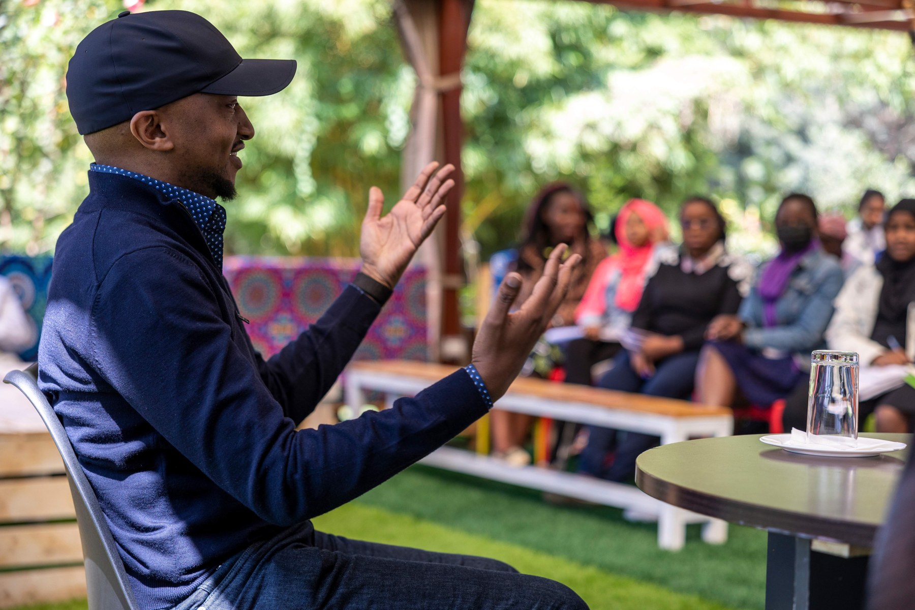 An outdoor talk with codeHive students at AkiraChix