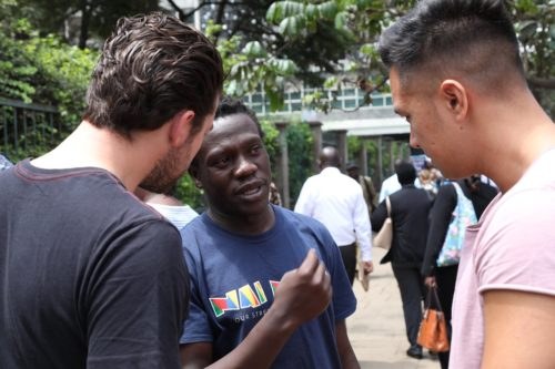 A Nai Nami storyteller talking with visitors on a Nairobi walking tour
